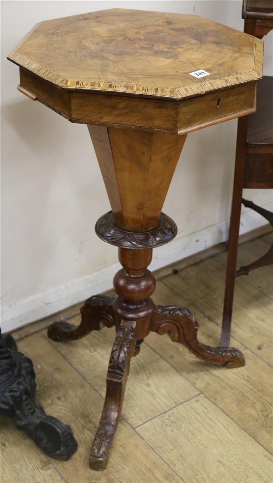 A Victorian walnut trumpet work table